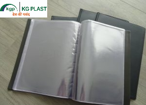 An open black folder showcasing clear plastic inner pages, resting on additional black folders.