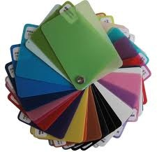 A color swatch fan displaying various colorful polypropylene (PP) sheet samples arranged in a circle.