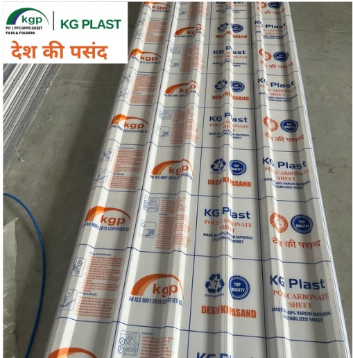 Corrugated polycarbonate roofing sheet covered in protective film with KG Plast branding.